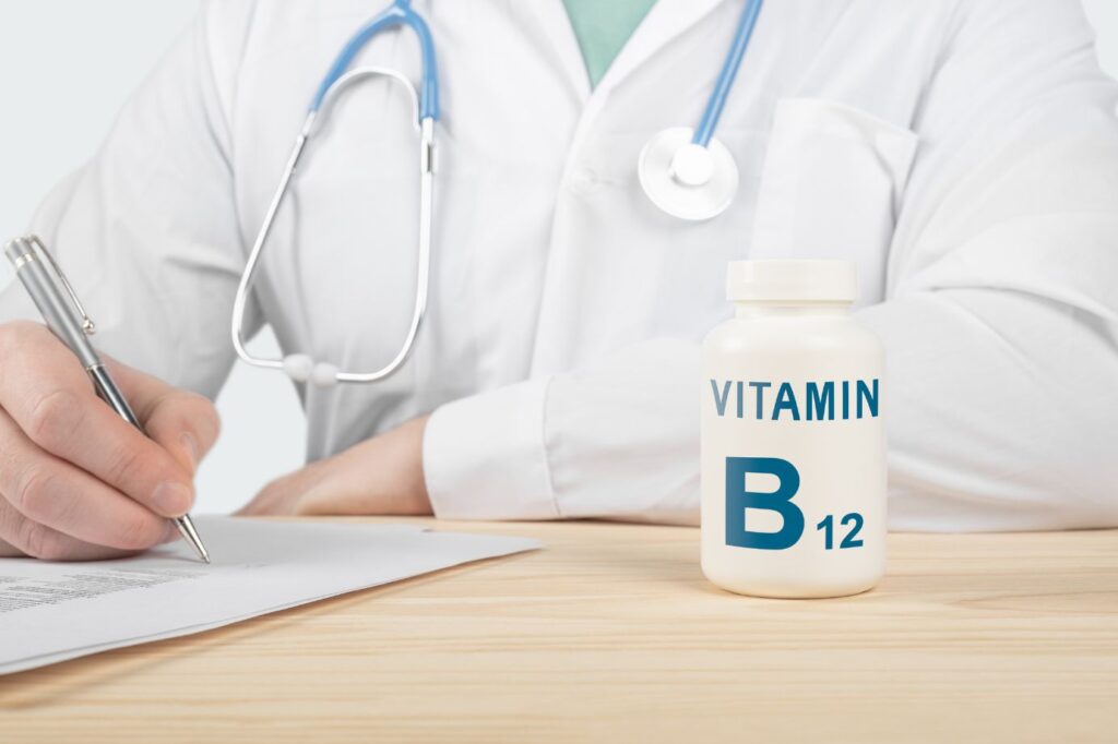 Doctor with vitamin b12 capsule